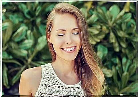 Smiling woman enjoying a calm mind