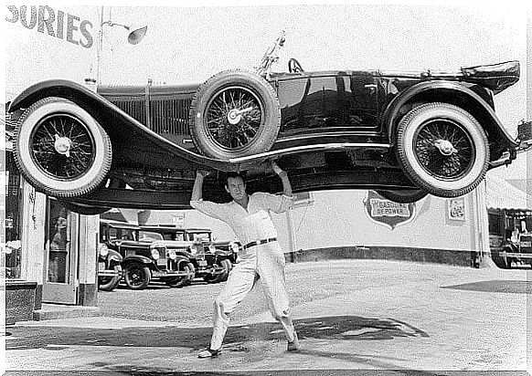 Man lifting car using adrenaline