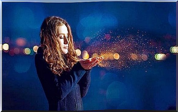 Girl blows gold dust and tries to rediscover her inner child