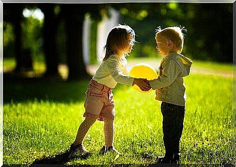 Children playing with a balloon show the importance of playtime in children