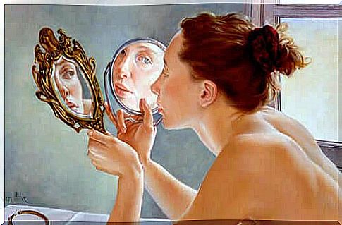 Woman sees herself in mirror