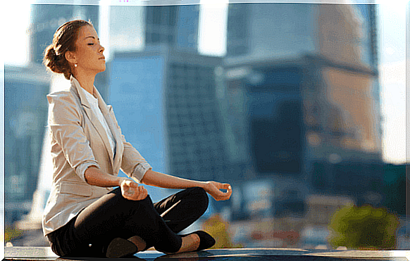 Woman practices mindfulness at work