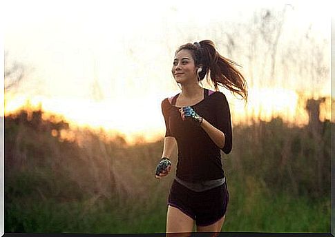 Woman running and enjoying mindfulness in sports