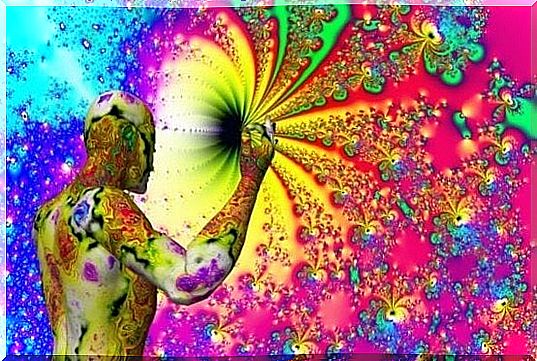 Colorful image of man and universe illustrates mirror-touch synesthesia