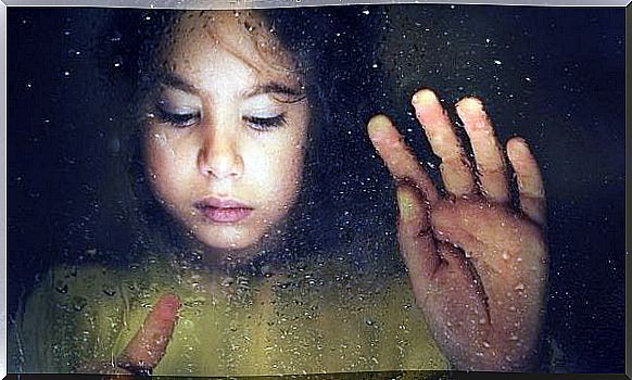 Girl by window commemorates parents' death