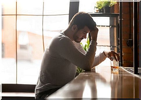 Man having a drink in a bar