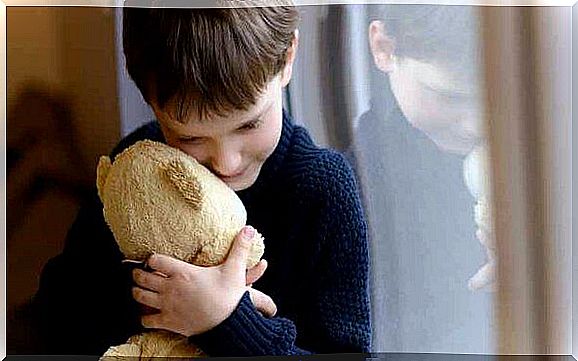 Boy with teddy bear has separation anxiety