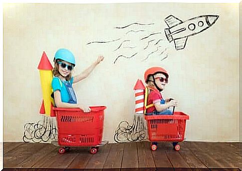 Symbolic thinking: Two children play that shopping baskets are space rockets