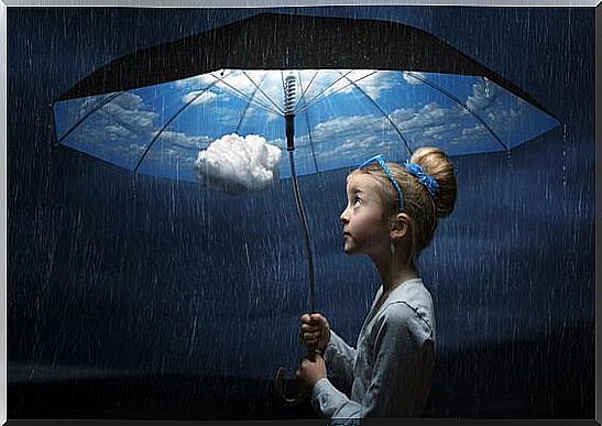 Girl has clear sky inside umbrella with rain outside as she has learned to deal with frustration