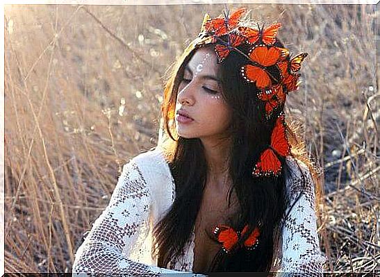 Woman with butterflies in her hair