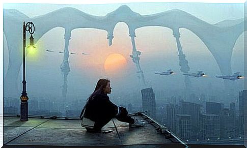 Woman on roof looking out over city and pondering over future