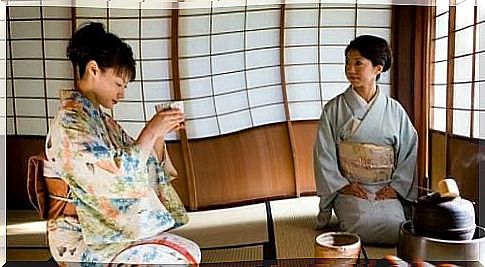 Women perform the tea ceremony