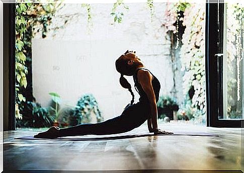 woman practicing yoga